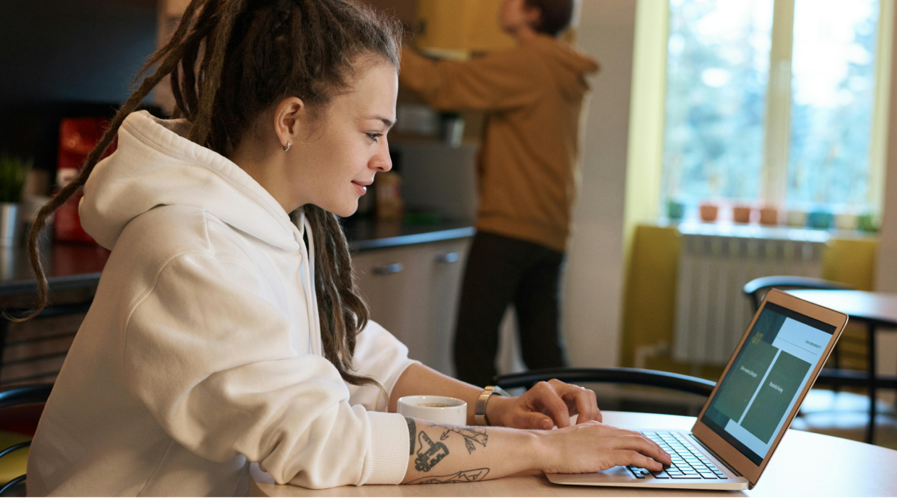A woman working from the comfort of her own home.